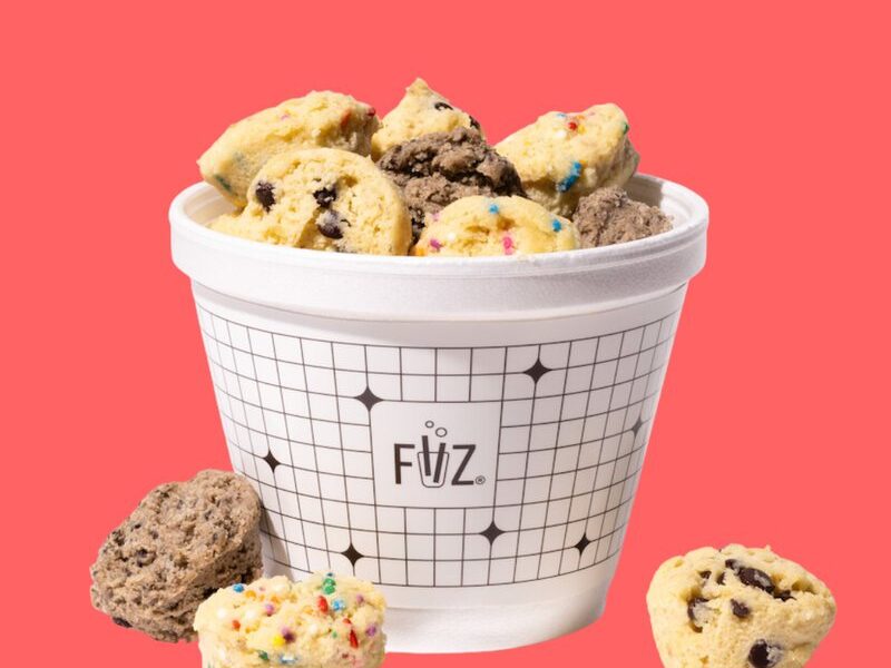 A cup of FiiZ dough bites with sprinkles and chocolate chips